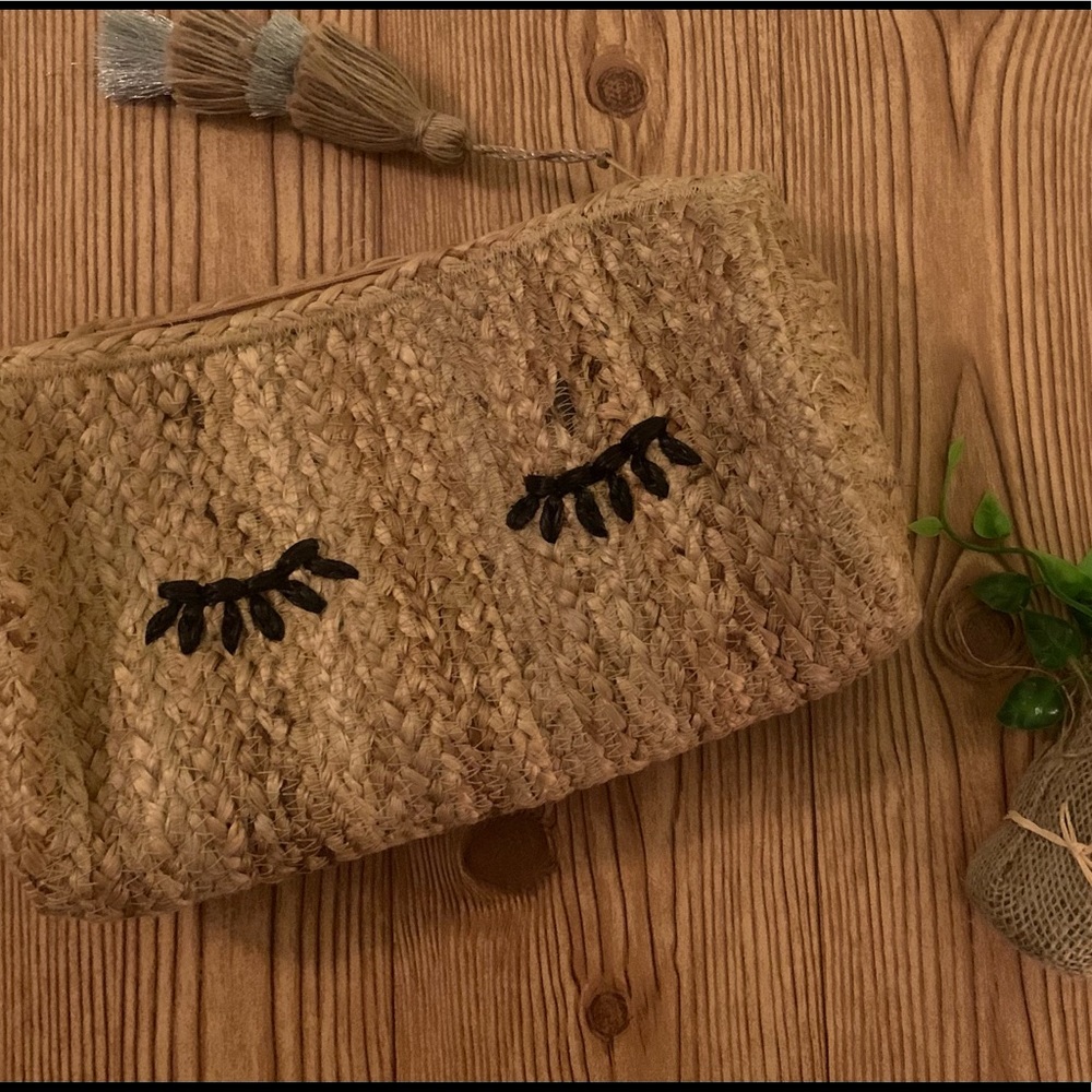 Jute zipper clutch with eyelash detail and Pom Pom